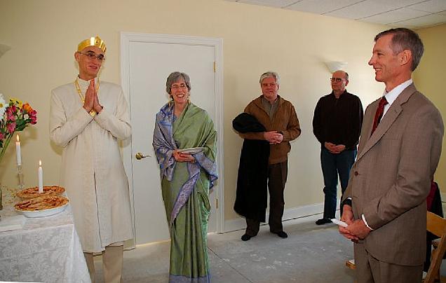 13 wishes to Jim Horwath.jpg - Dedicated member of the Maharishi Peace Palace lights the light and makes a wish for the peace, prosperity, and happiness through Maharishi programmes to all the citizens of Minnesota and the whole USA